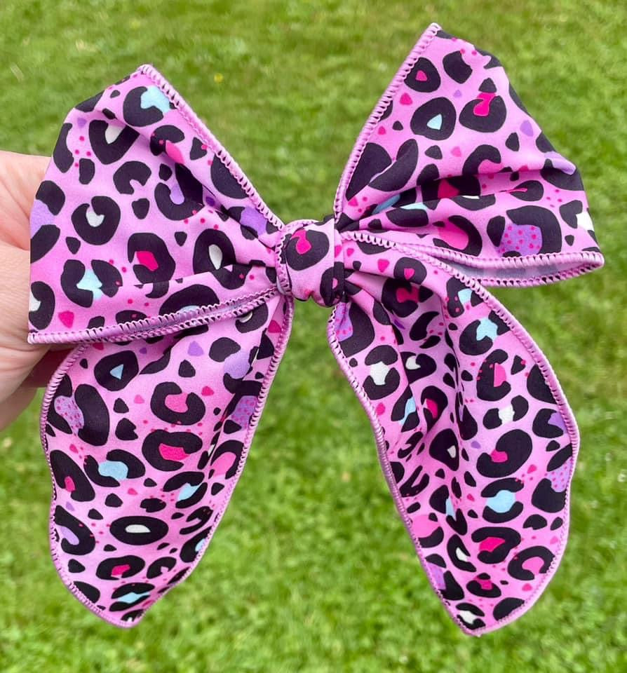 Pink Rainbow Cheetah 5-6in Serged Hand Tied Bow