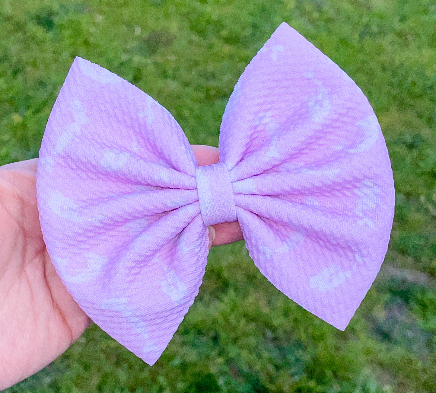 Mermaid Silhouettes on Pink Fabric Bow